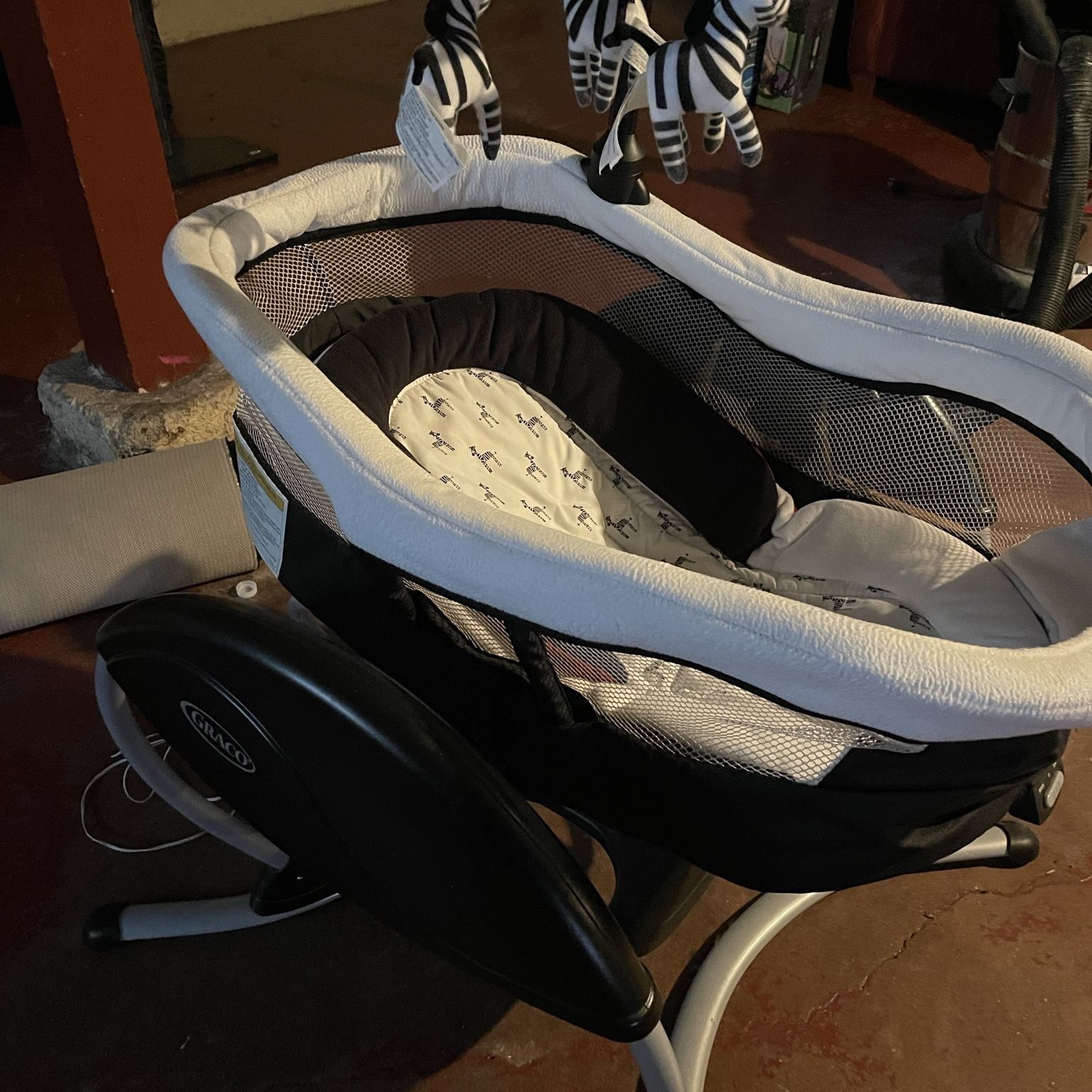 Graco zebra glider hot sale