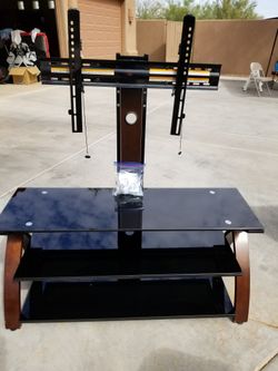 TV Stand w/ 3 Glass Shelves....holds Up To A 70in. Flat Panel Tv