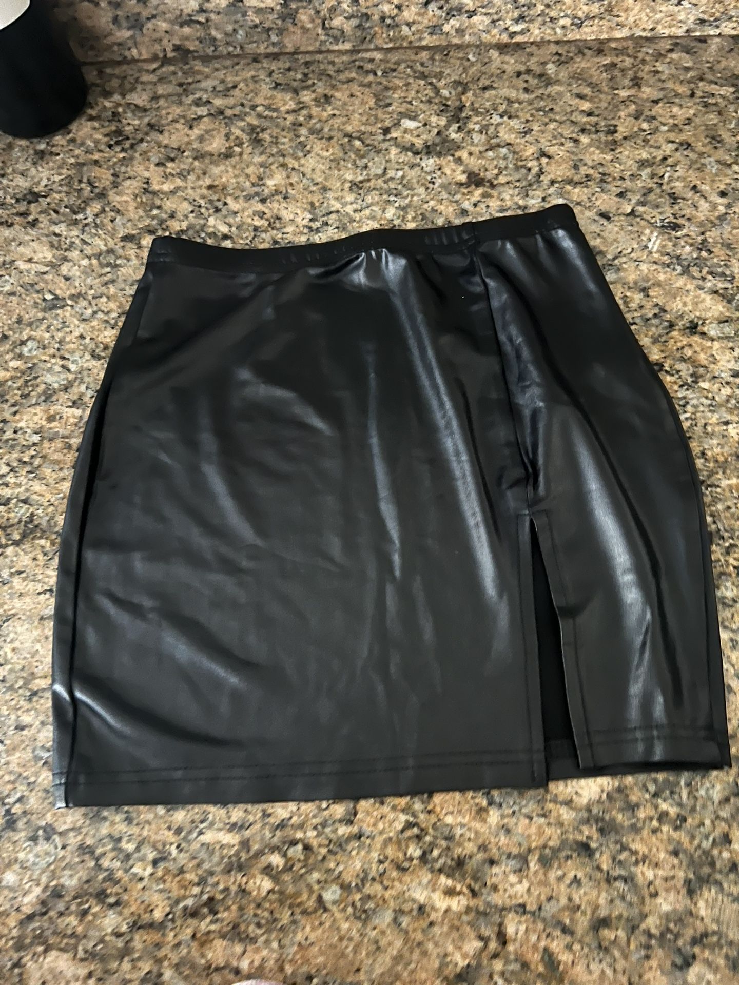 Black Pleather Mini Skirt With A Slit