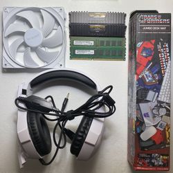 Gaming PC parts, mousepad, and headphones