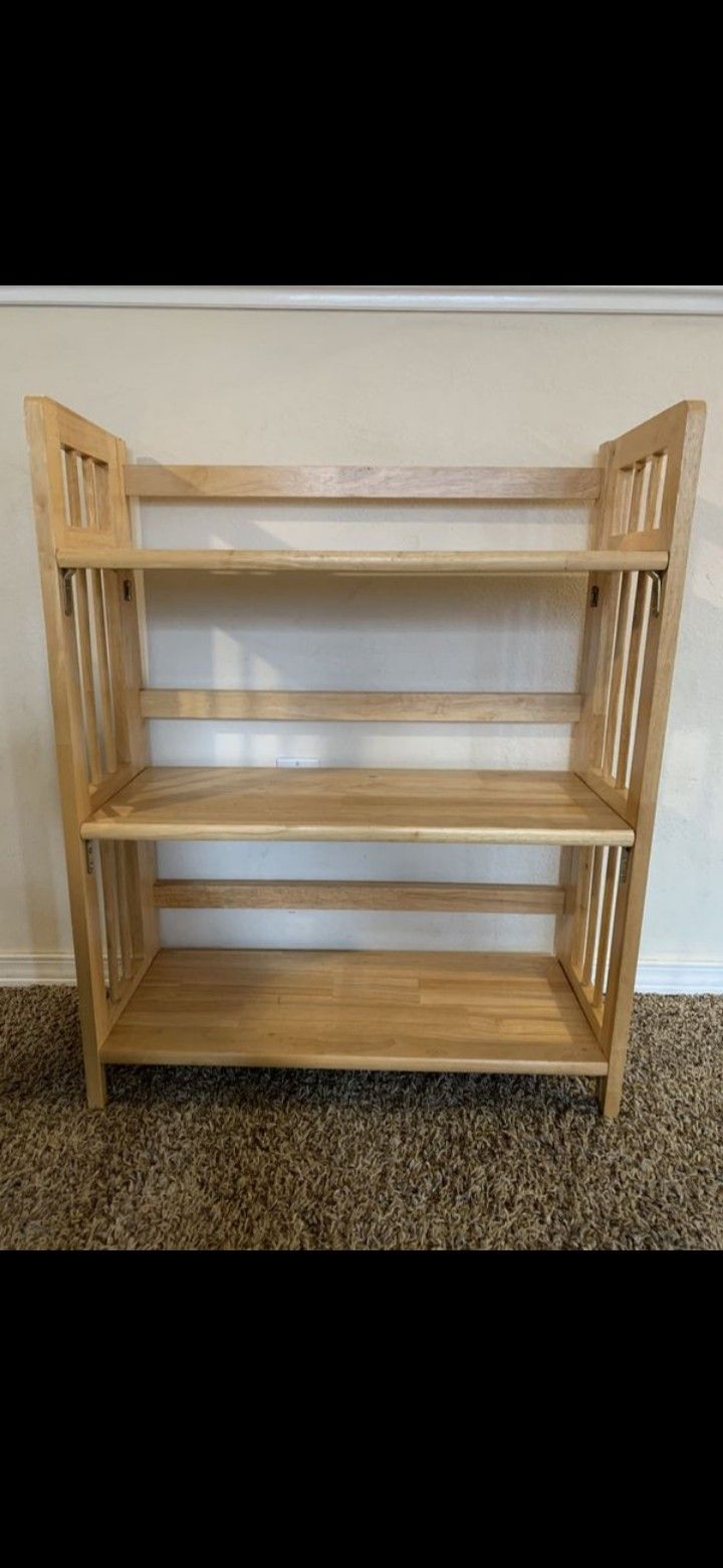 Small foldable shelf..Small 3-shelf bookcase, foldable, light wood.