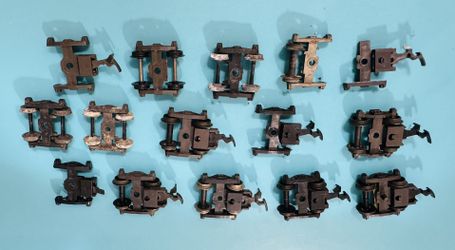 Lot of HO scale Trucks & Couplers - Some wear - $5 for all in the first pic 