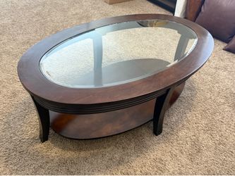 Oval Dark Wood Coffee Table with Glass Top