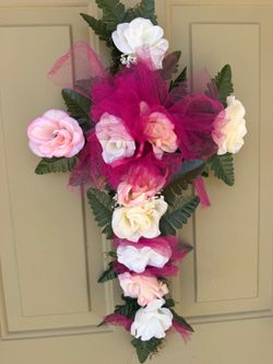 Pink cross flower decoration
