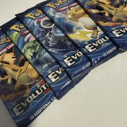 Pokémon XY Evolutions Booster Packs (Sealed) – Lot of 11 – Charizard, Blastoise, Pikachu Art