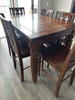 Measures 6 chairs in hardwood