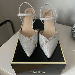 Brand new silver heels, size 7