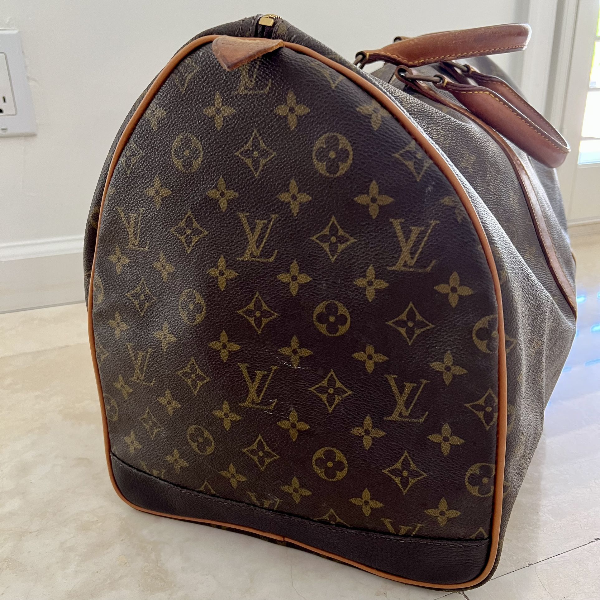 Keepall 55 Bandoulière  Used & Preloved Louis Vuitton Travel Bag