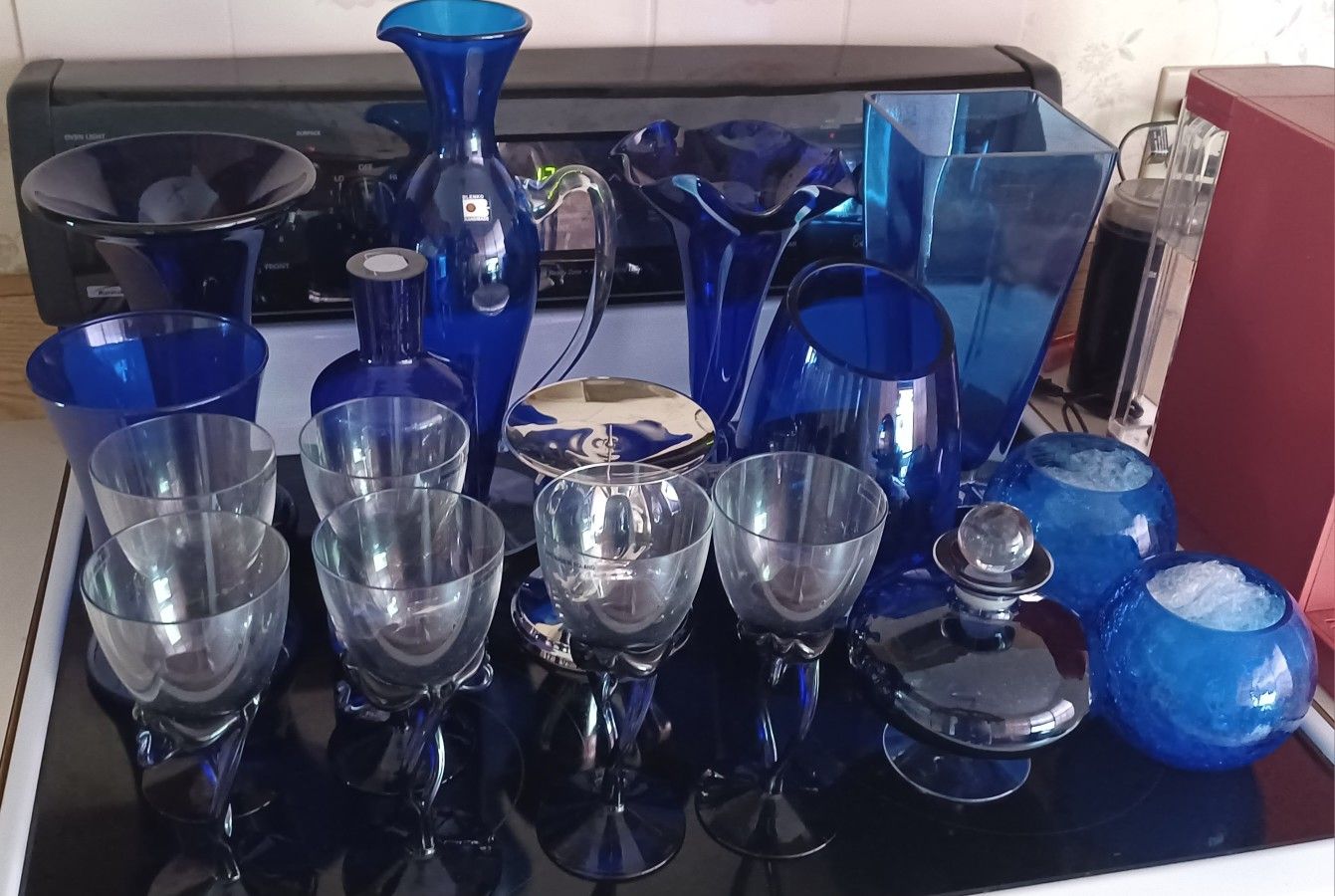 17 PIECE LOT OF COBALT GLASS VASES, CANDLE HOLDERS, WINE GLASSES