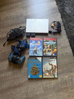 PlayStation 2 Slim Bundle with 4 Games