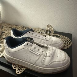 Blue and White Nautica Kid Shoes.