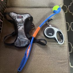 Assorted dog items - retractable leash. Harness and Chuckit ball thrower