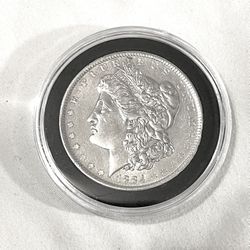 About Uncirculated-AU(50)  1884-O Morgan Silver Dollar. Valued $86 on US Coin book.
