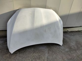2006-2014 Toyota RAV4 hood with accessories OEM.