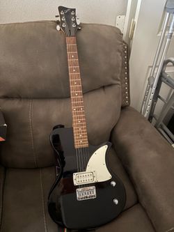 First Act ME502 solid-body electric guitar