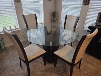 Beautiful Thick Glass Table with Four Chairs.