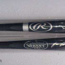 Signed Baseball Bats - JOSE CANSECO & JOE ORLANDO 