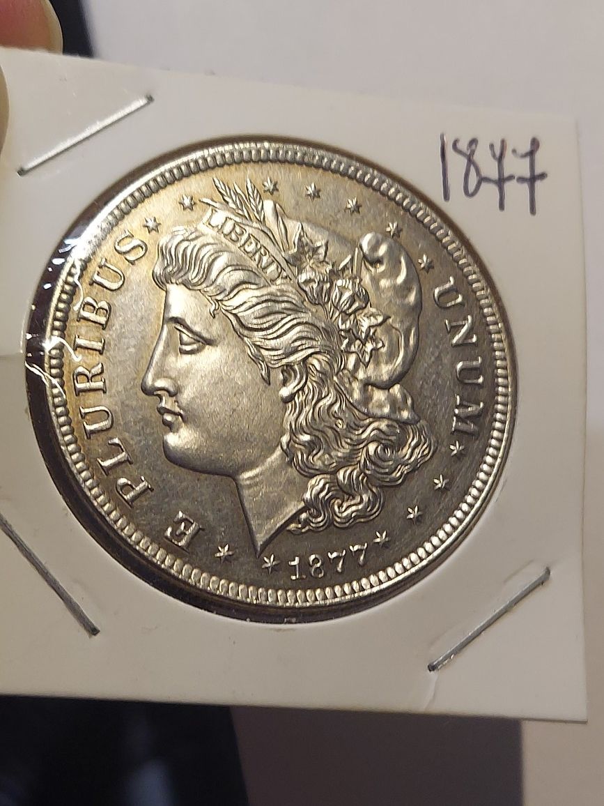 1X1 REMAKE US SOUVENIRS COIN (1877) MORGAN SILVER PLATED 26.7 GRAMS.