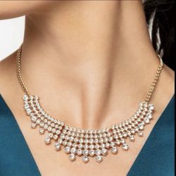 Shimmering Song - Brass White Rhinestone Necklace