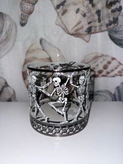 Dancing skeleton 3-wick candle holder