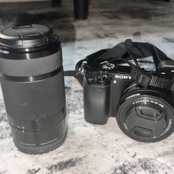 (Bundle): Sony a6000 Mirrorless Camera + 16-50mm + 55-210mm Lens Bundle – Good Condition