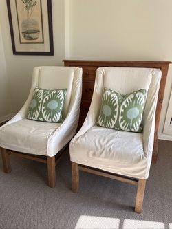 Pair of Slipcovered Accent Chairs with Wood Legs