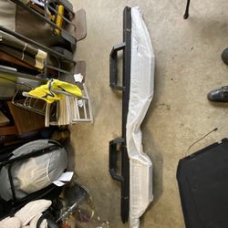 Step bar for a crew cab.