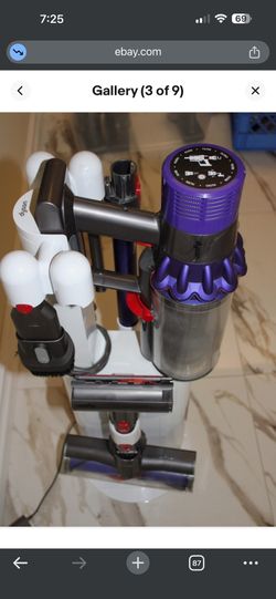 This is a Dyson Cyclone V10 Dok, a free-standing dock designed to store and recharge the Dyson Cyclone V10 vacuum a