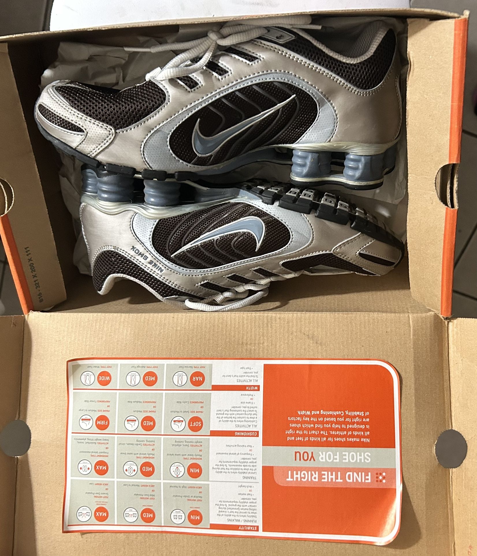 Nike Shox Navina+ Women's Shoes in silver, blue, & brown.