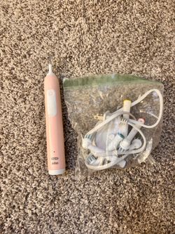Pink Oral B Electric Toothbrush