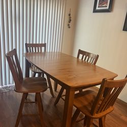 Dining Table With Four Swivel Chairs In Very Good Condition, 60 Inches Long And 36 Inches Wide With Leaf In