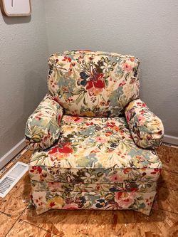 Upholstered swivel rocker chair