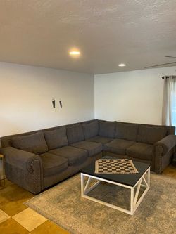 Large Dark Gray Sectional Sofa with Nailhead Trim