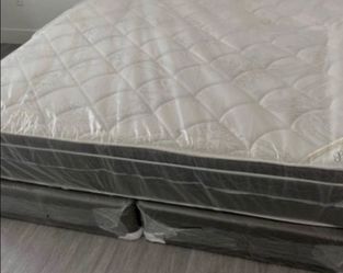 Brand new king size mattress regular + free box spring as a gift