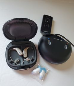 Oticon Rechargeable Hearing Aids with Charger & Remote – Pre-Owned