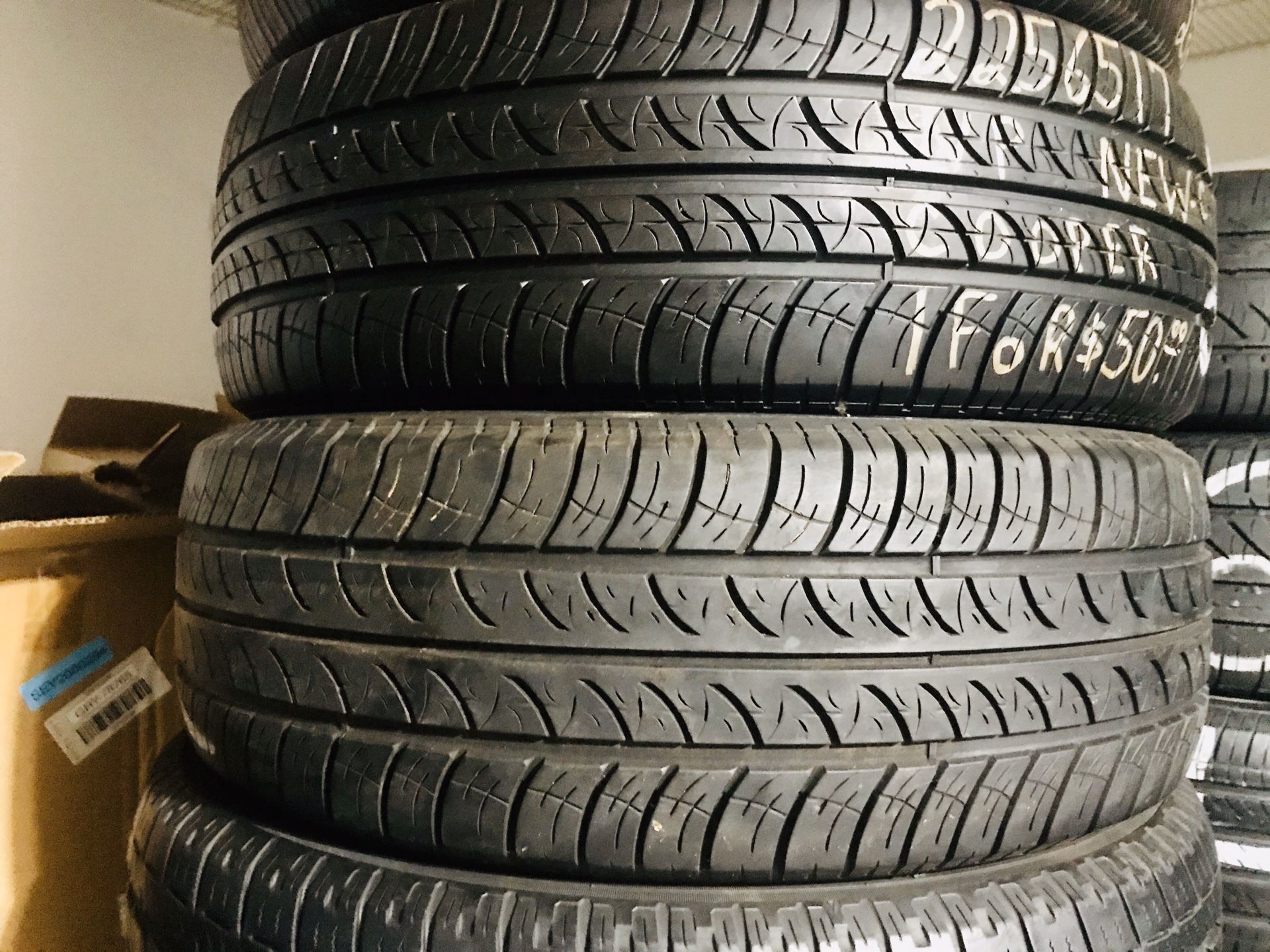 Two 225/65/17 Cooper All Season Tires w/ 70% Tread