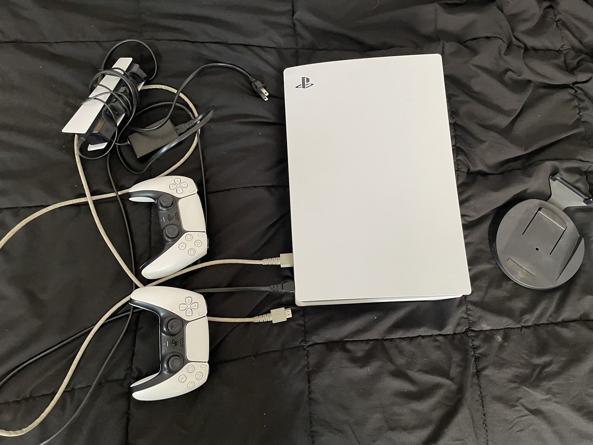 PS5 with 2 controllers and docking station
