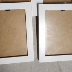 2 white 4×6 photo frames