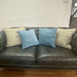 A Set Of Three Alsage Wide Faux Leather Rolled Arm Chesterfield Love Seat , Sofa And A Chair