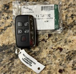 Genuine Jaguar Keyless Entry Transmitter T4A12800 -NEW OEM -