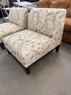 Slipper accent chairs.