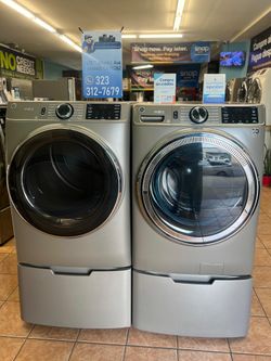 GE Frontload Washer and Dryer with Pedestals