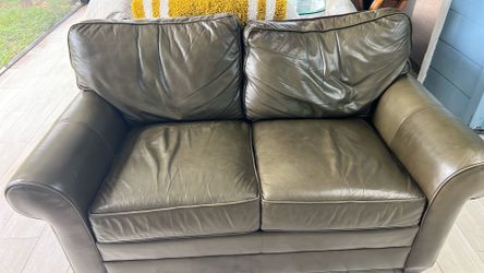 100% Leather love seat