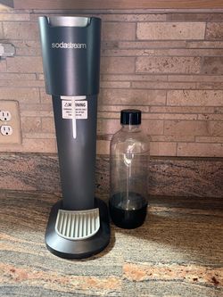 SodaStream Genesis seltzer maker with pressurized bottle