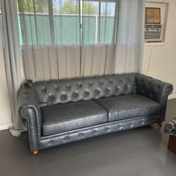 Chesterfield style sofa   $175 8x3 ft