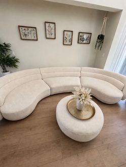 IVORY/WHITE CURVED COUCH 136in (3 pieces attach)
