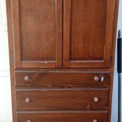 Wooden Armoire With Drawers