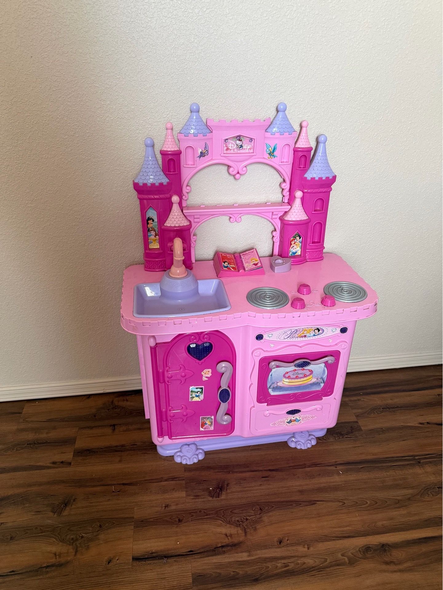 Toy pink kitchen and toy food