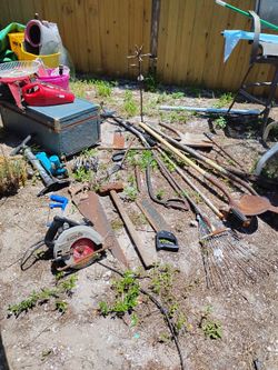 Gardening Tools Saw Shovels A Snake For The Commode The Electric Saw It Works