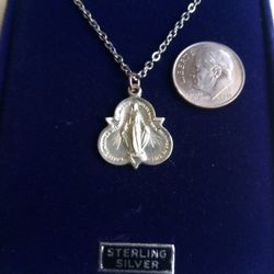 Sterling Silver Miraculous Medal on an 18 inch stainless steel chain. Religious jewelry.